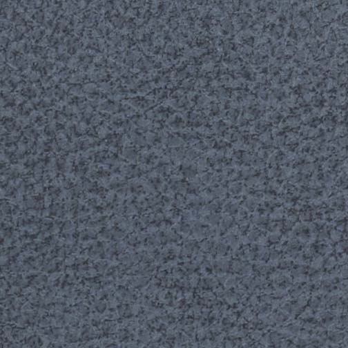 Close-up of a textured, grayish-blue surface similar to the fabric of the Golden Tech PR766 Relaxer MaxiComfort Recliner With Lift Assist - Small. The lighting highlights small, uneven bumps and grooves, creating a mildly coarse, pebble-like pattern.